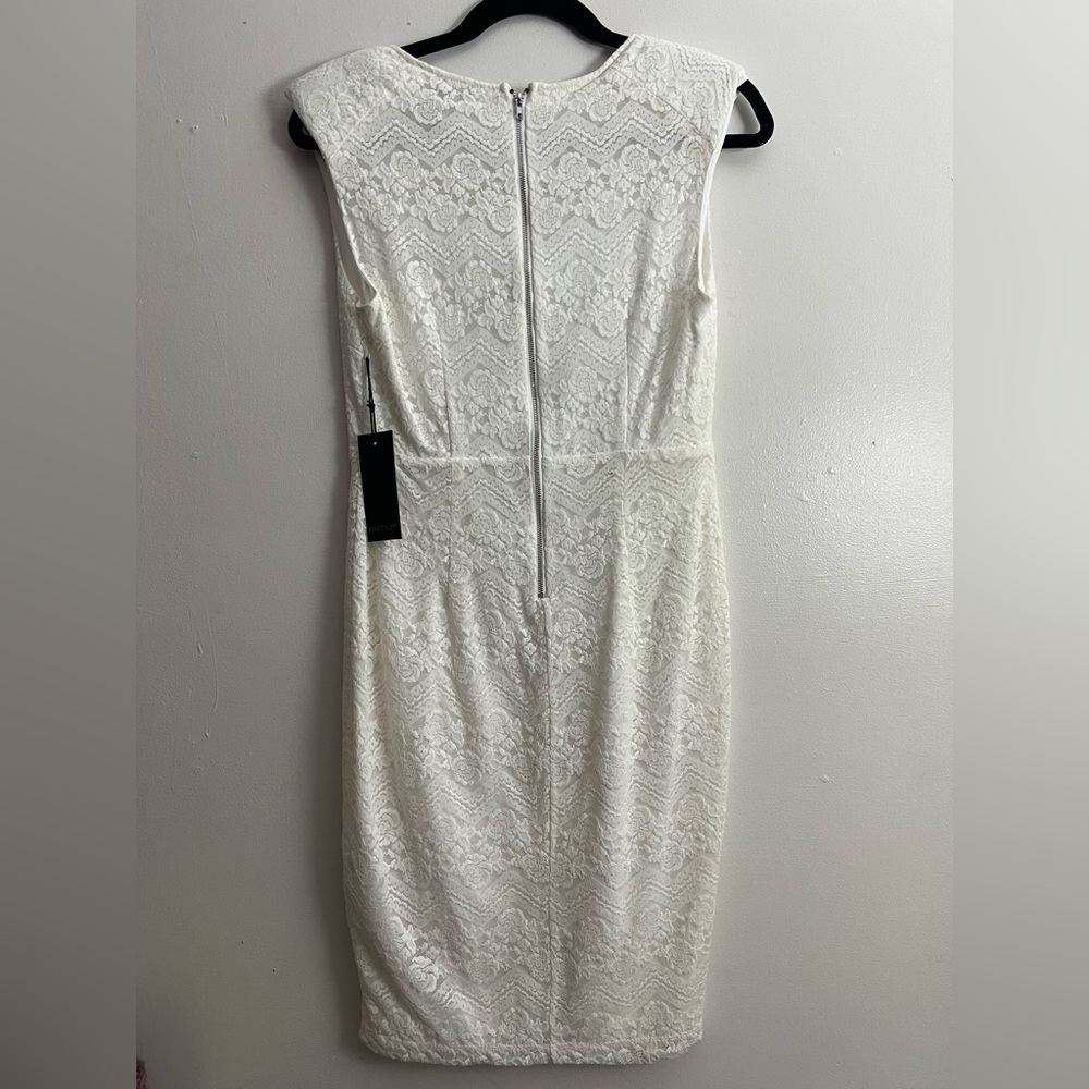 Lace white sleeves dress . V-neck size NWT. Lined. Size L